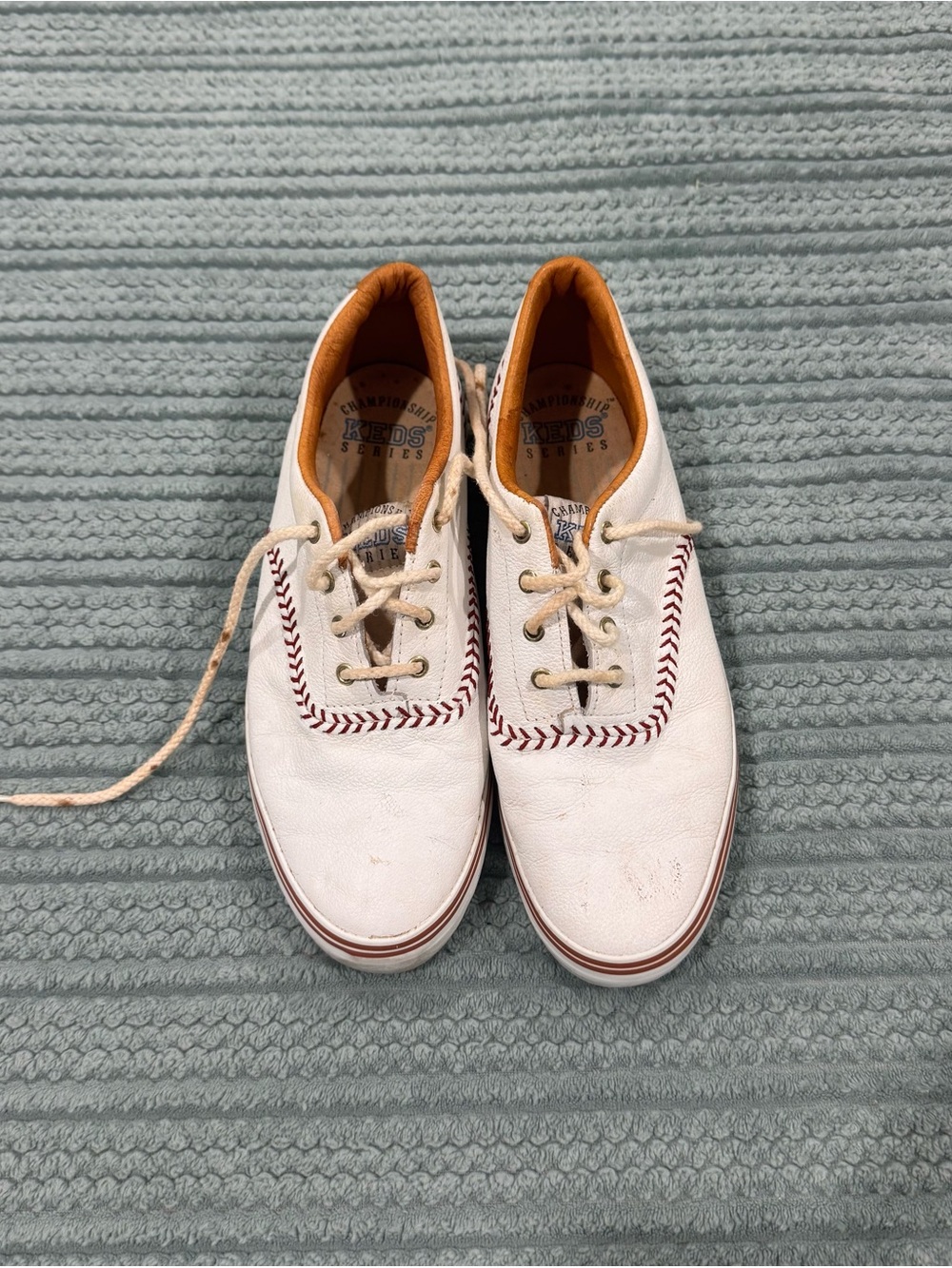 Keds White Canvas Sneakers with Red Stitch Detailing